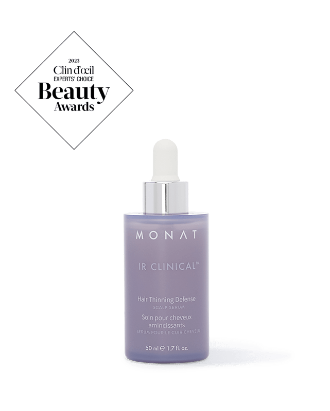 Monat IR Clinical Hair Thinning Defense scalp serum bottle with dropper on a white background; purple label and shiny cap, award badge in top-left corner.