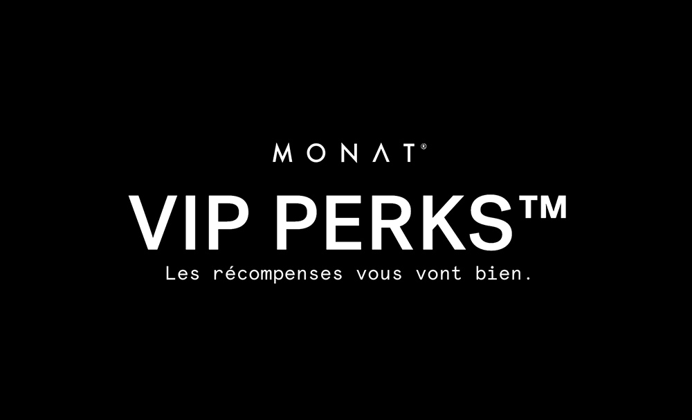 The MONAT VIP Points logo overlaying a photo of a brunette female with wavy hair that is smiling.