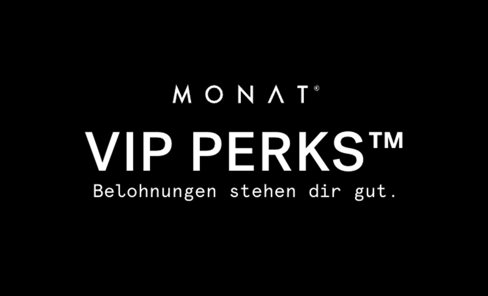 The MONAT VIP Points logo overlaying a photo of a brunette female with wavy hair that is smiling.