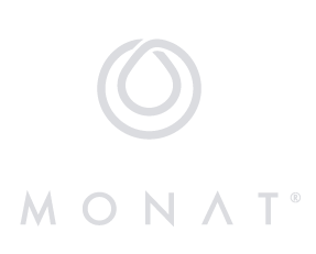 MONAT brand logo in light gray on a black background