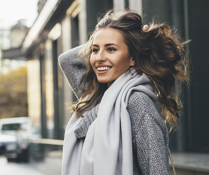 Beautiful woman with long and straight messy hair