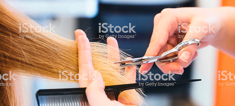 Close-up-of-scissor-cutting-woman’s-hair_1