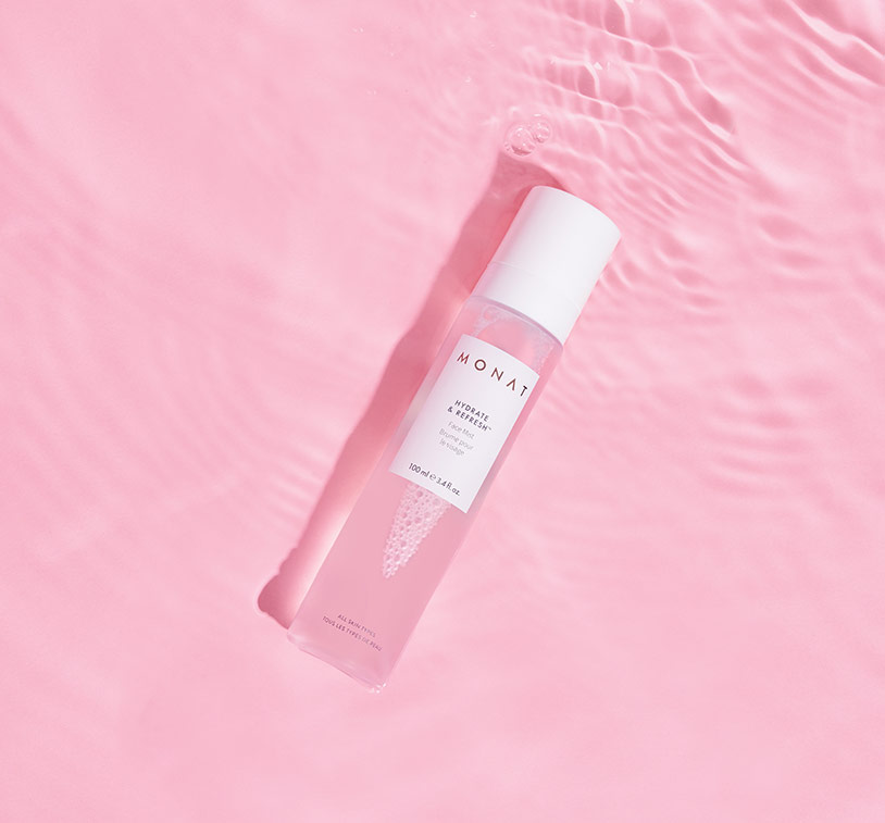 MONAT Hydrate & Refresh product is set over a pink water texture background and ripples.