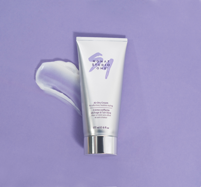 Air dry cream product over purple background next to sample of the product