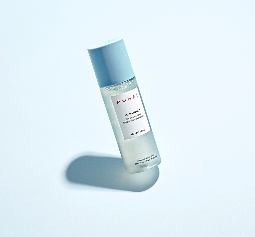 BE CLARIFIED™ Blemish Care Toner standing infront of a light blue background.  