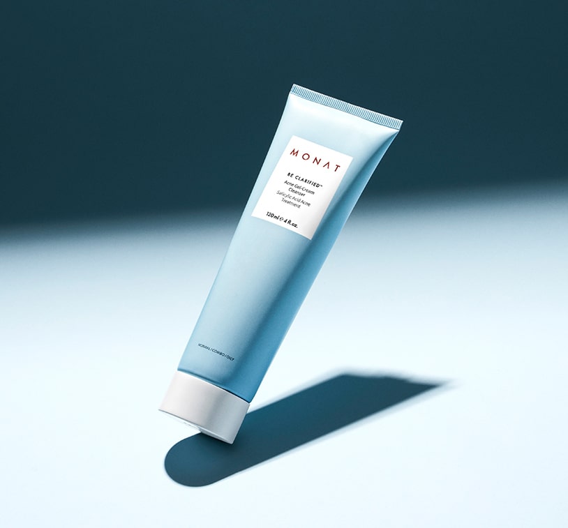 ABE CLARIFIED™ Acne Gel-Cream Cleanser standing infront of a light blue background.  