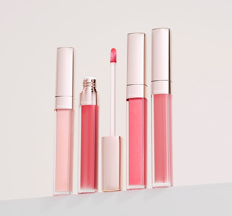 picture of the four MONAT Lip plumping gloss shades.