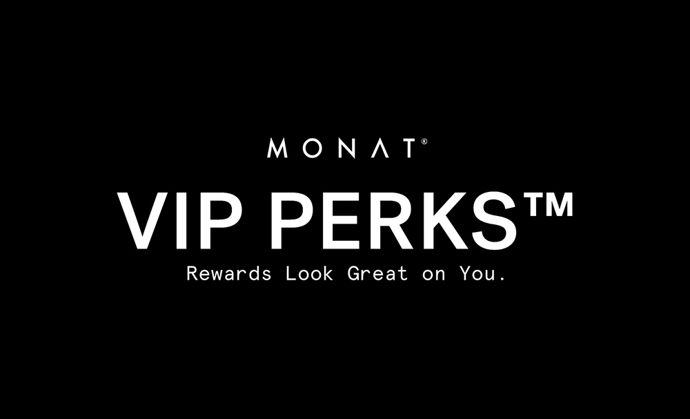 The MONAT VIP Points logo overlaying a photo of a brunette female with wavy hair that is smiling.