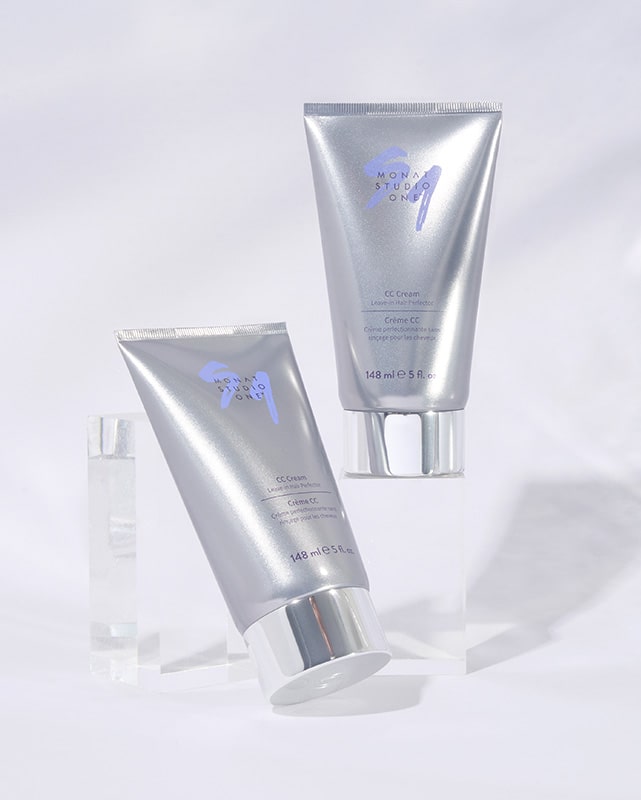 Two tubes of MONAT STUDIO ONE™ CC Cream elegantly displayed on a clean surface.