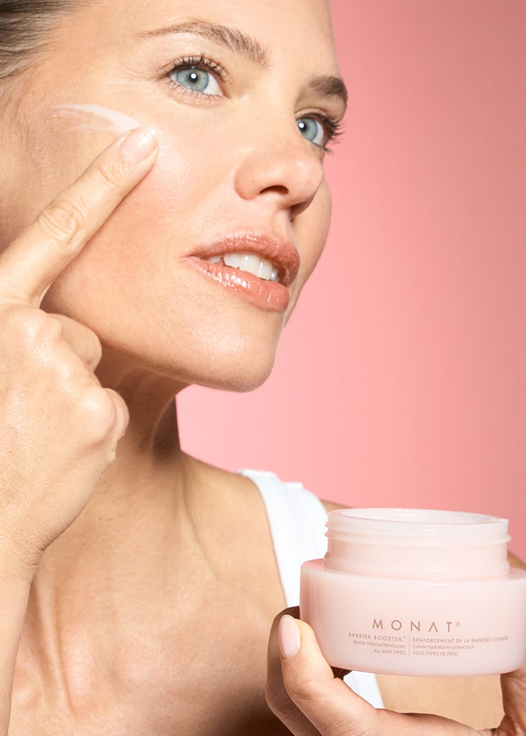 Video thumbnail of woman applying MONAT Barrier Booster™ Barrier Defense Moisturizer to her cheek.