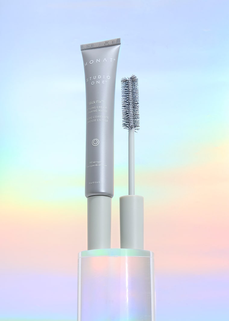 MONAT Studio One Slick Fix™ Styling Cream Taming Wand with brush applicator for smoothing and taming hair.